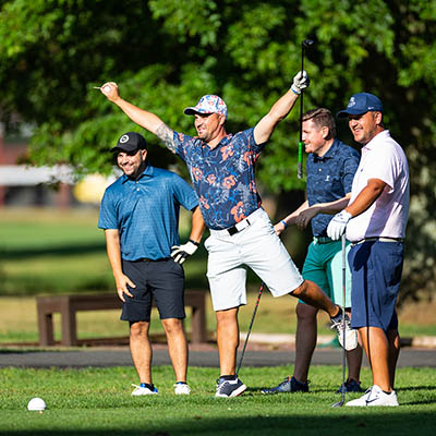 People at golf tournament