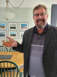 Bill Hogan with Tim Horton cookie