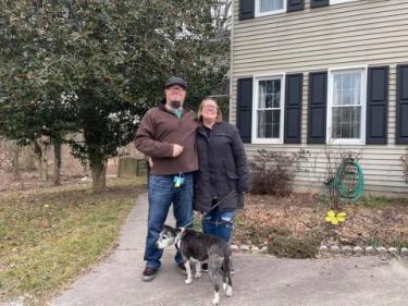 The Kings with their dog at new home