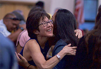 Two women hugging