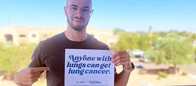 Person holding sign