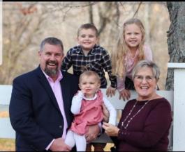 Bill and Heather Hogan with grandchildren 