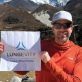 Jay standing with Mount Ama Dablam behind him
