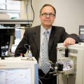Dr. Hanash standing in laboratory
