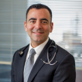 Close up photo Dr. Mark Awad smiling at work