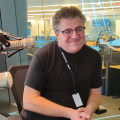 Photo of Neal Augenstein smiling