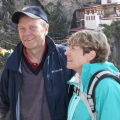 Tom and Mary Lynn Moser smiling in the mountains