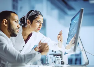 Two researchers studying data