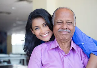 Family smiling at camera