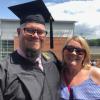 Melissa and husband Melissa with husband in graduation gown